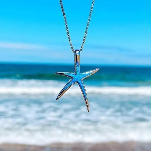 Halskette mit Seestern-Anhänger in Silber mit blauem Opal