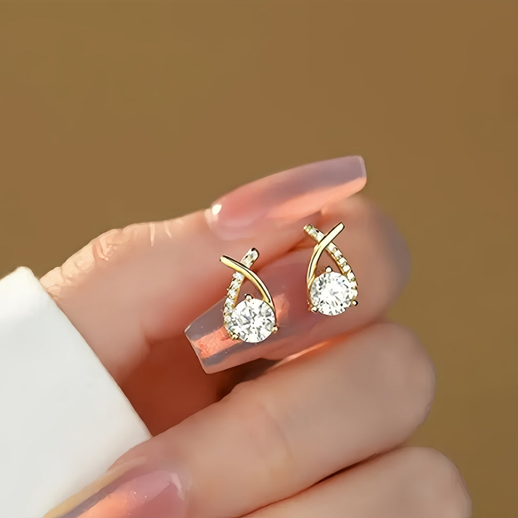 Ohrringe mit goldenem Kreuz und Zirkonia