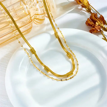 Doppelte Goldkette mit Vintage-Smaragd