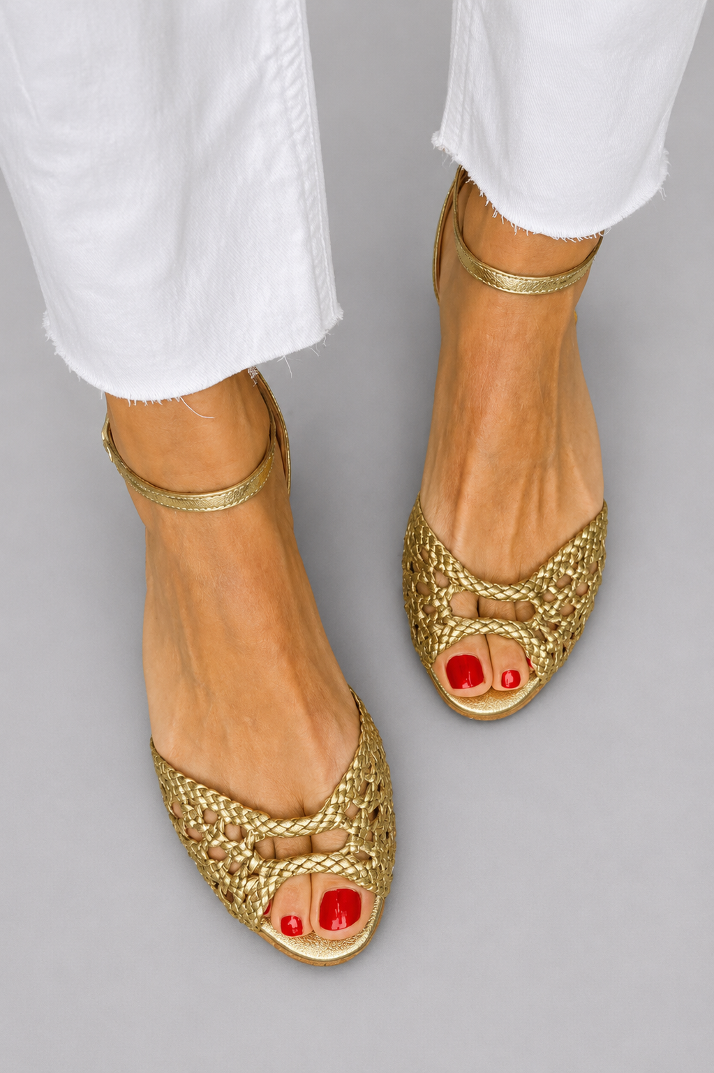 Isadora | Geflochtene Goldsandalen