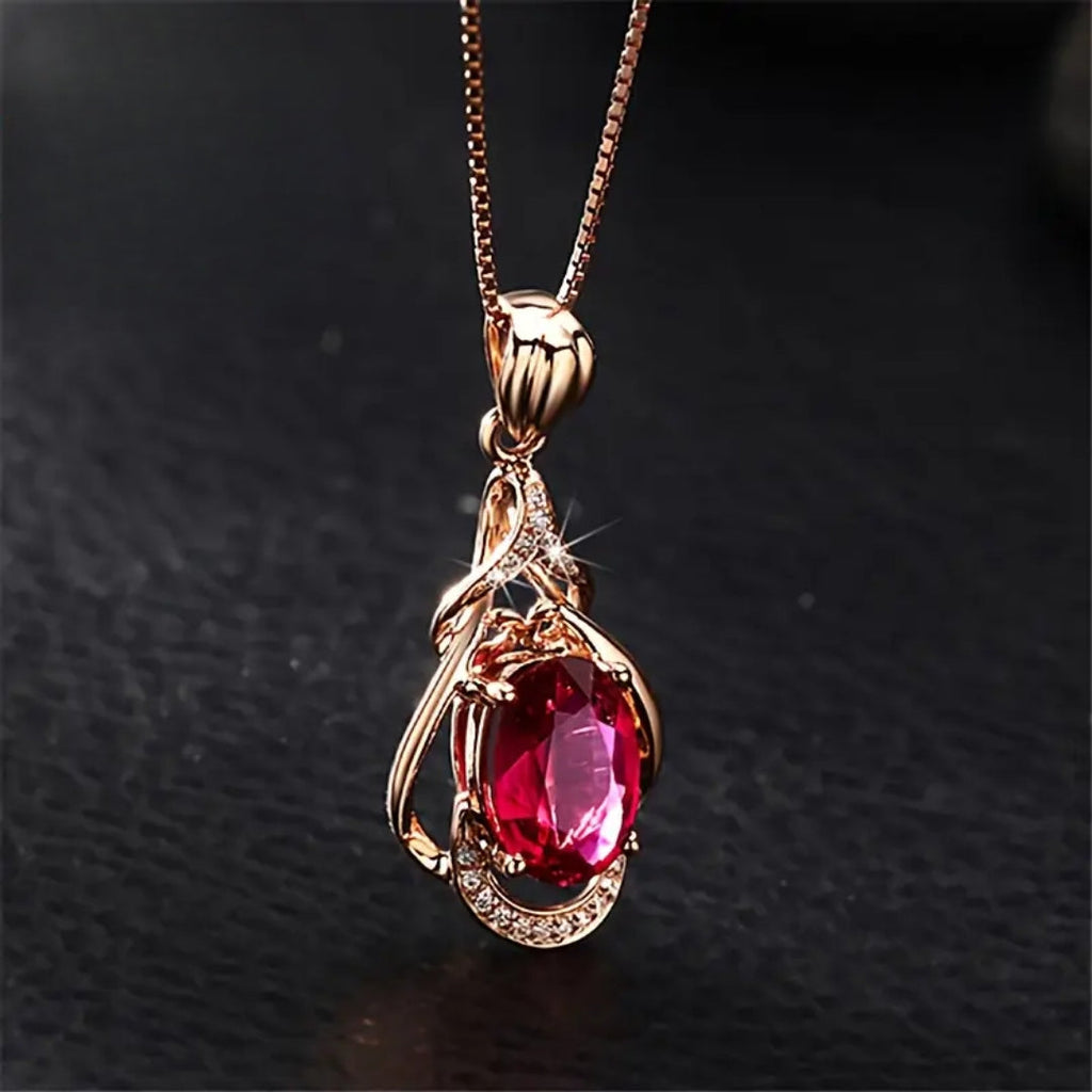 Elegante Halskette mit roten Kristallen und Gold