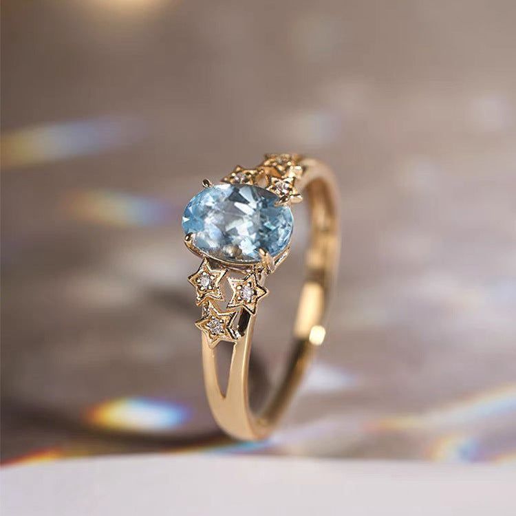 Exklusiver Goldener Ring mit Blauem Kristall