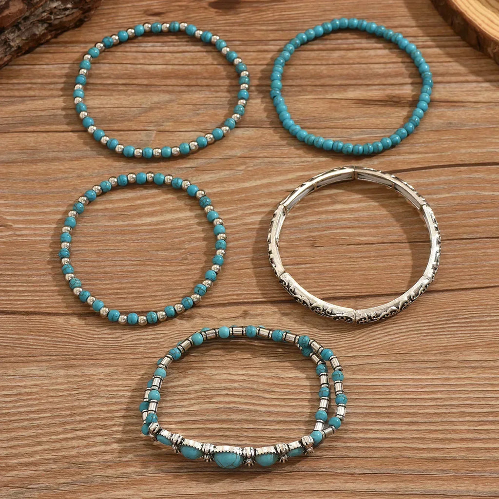 Armbandenset mit türkisfarbenen Perlen