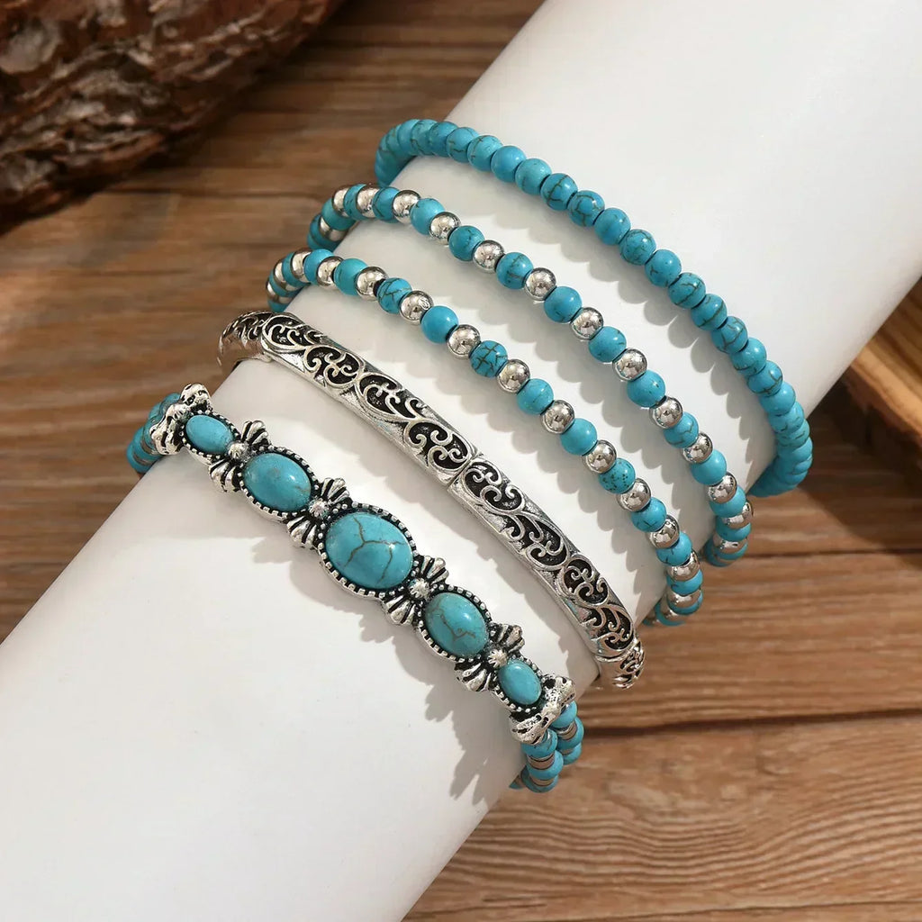 Armbandenset mit türkisfarbenen Perlen