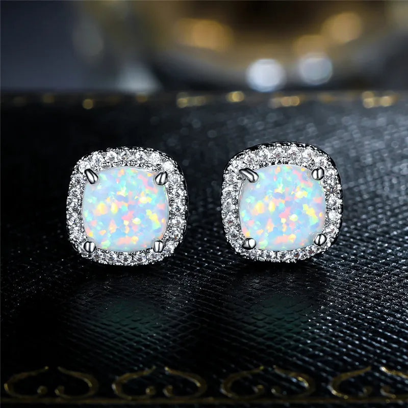 Elegante Silberohrringe mit Weißem Feueropal