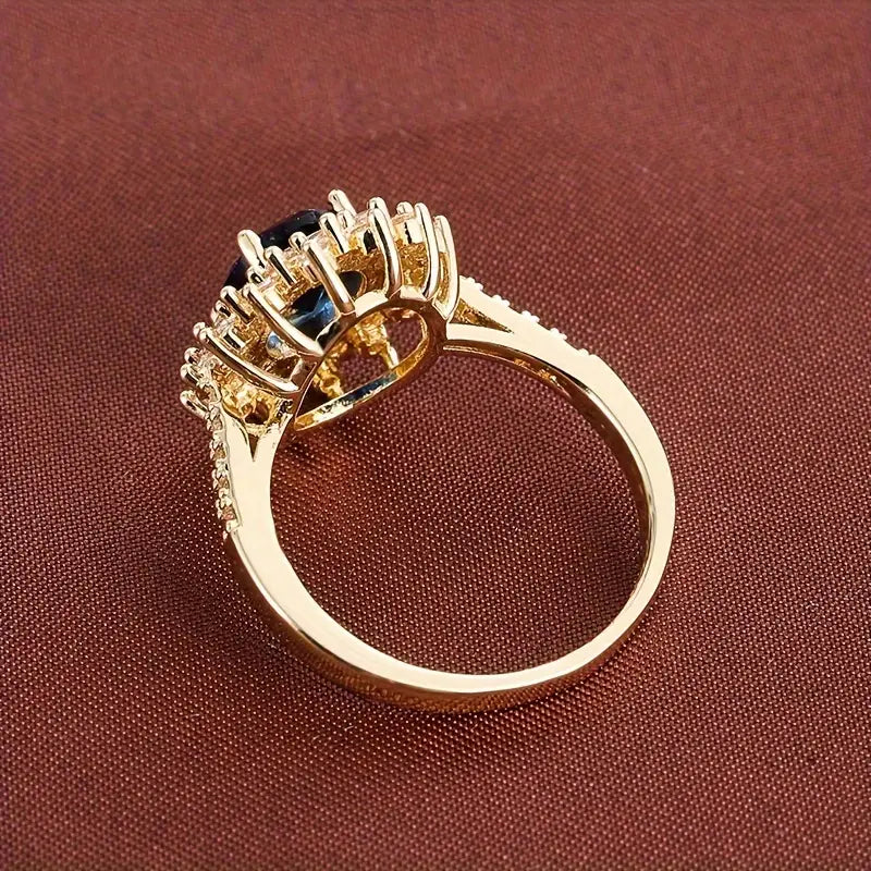 Goldener Ring mit Saphir