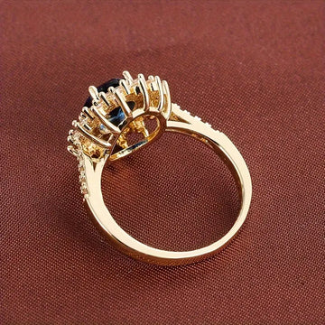 Goldener Ring mit Saphir