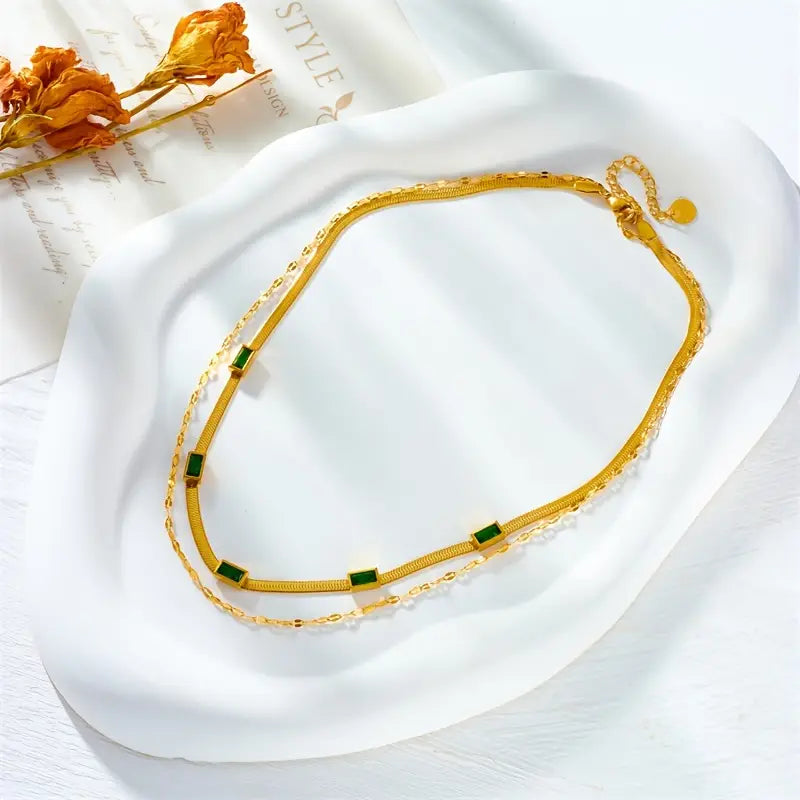 Doppelte Goldkette mit Vintage-Smaragd