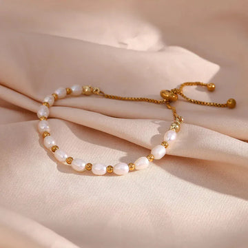 Elegantes Perlen und Gold Armband